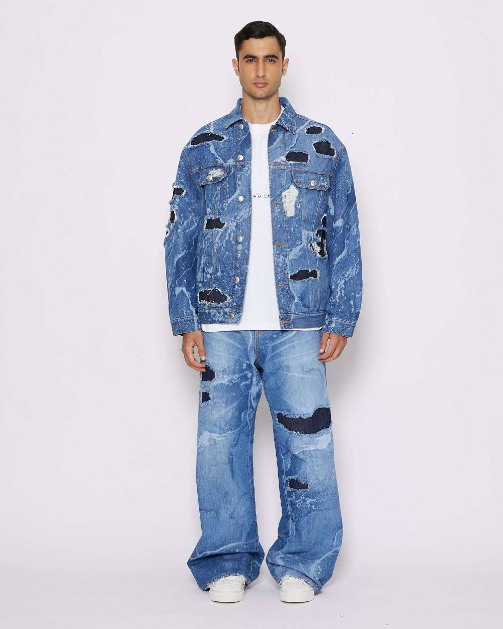 John Richmond Jeans gamba larga con strappi sul davanti Qualità Garantita