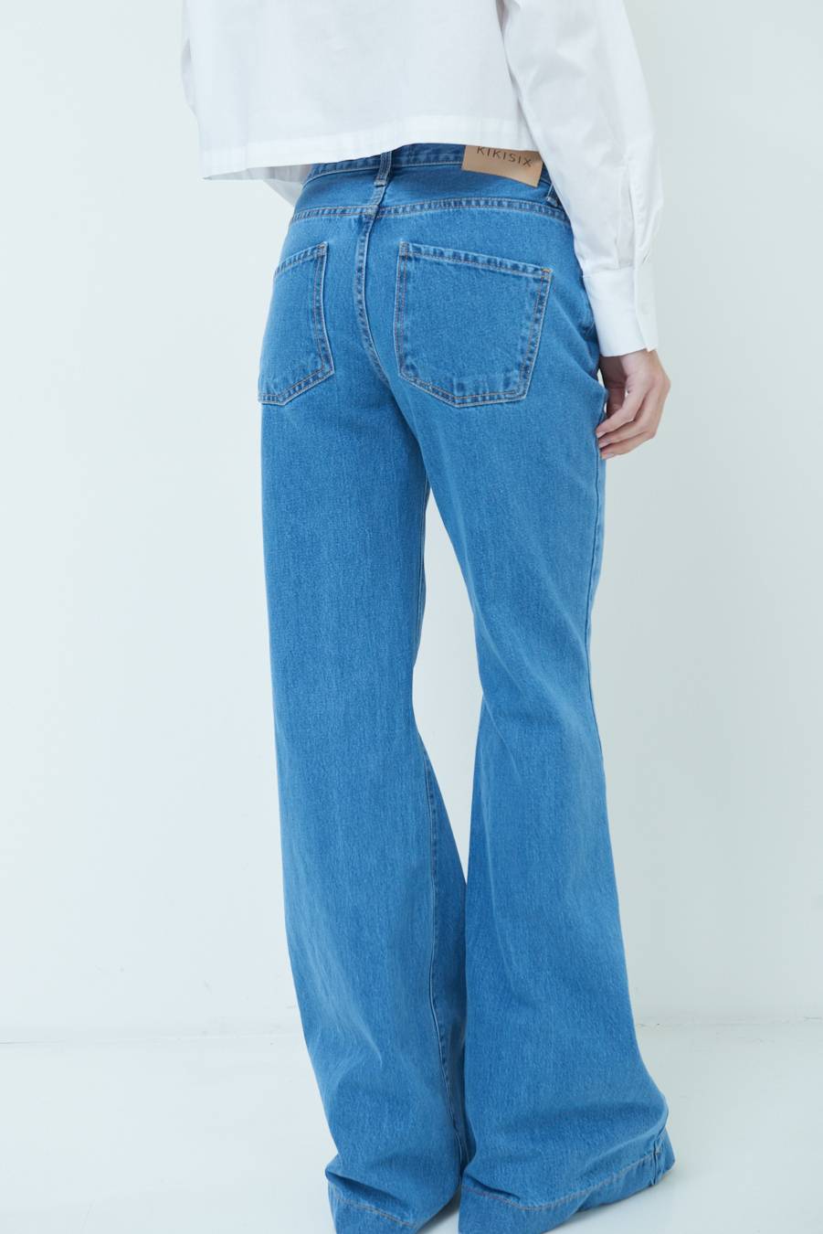 Kikisix PANTALONE ZAMPA CON RIBALTA DOPPIO STONE JEANS Qualità Garantita