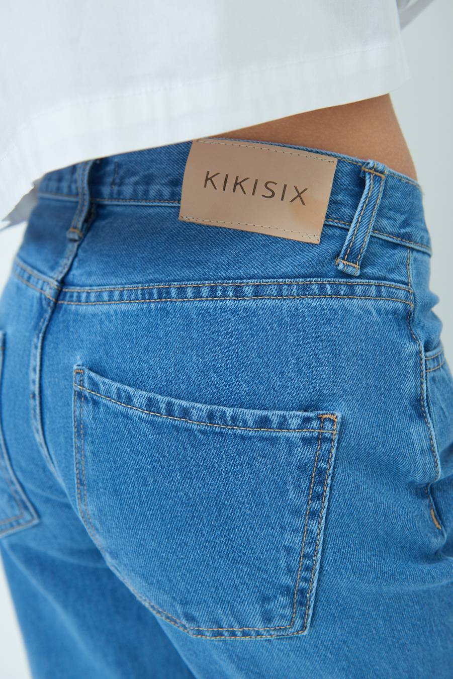 Kikisix PANTALONE ZAMPA CON RIBALTA DOPPIO STONE JEANS Qualità Garantita