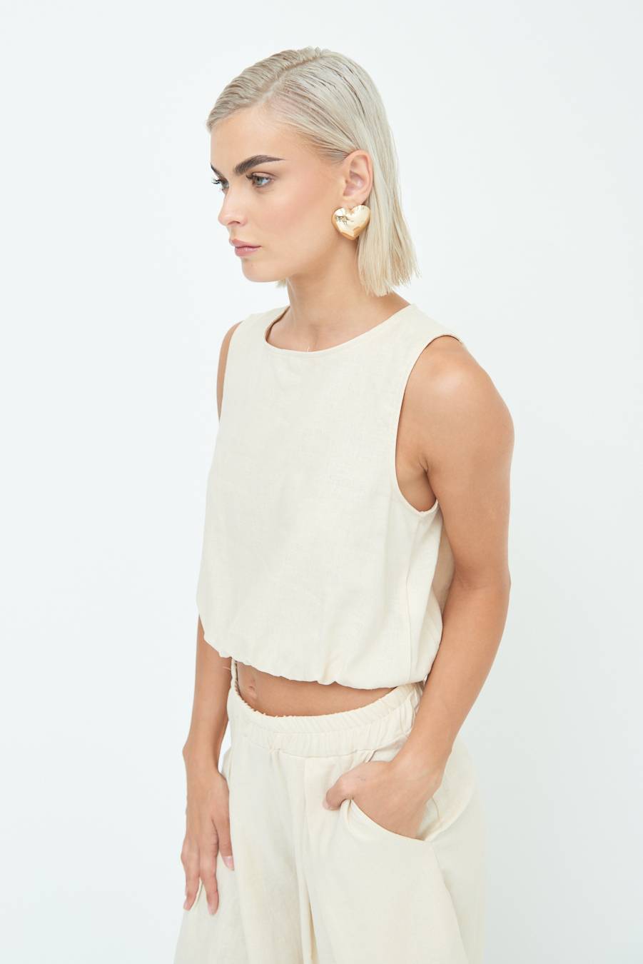 Kikisix TOP CORTO CON ELASTICO NATURALE I Più Venduti