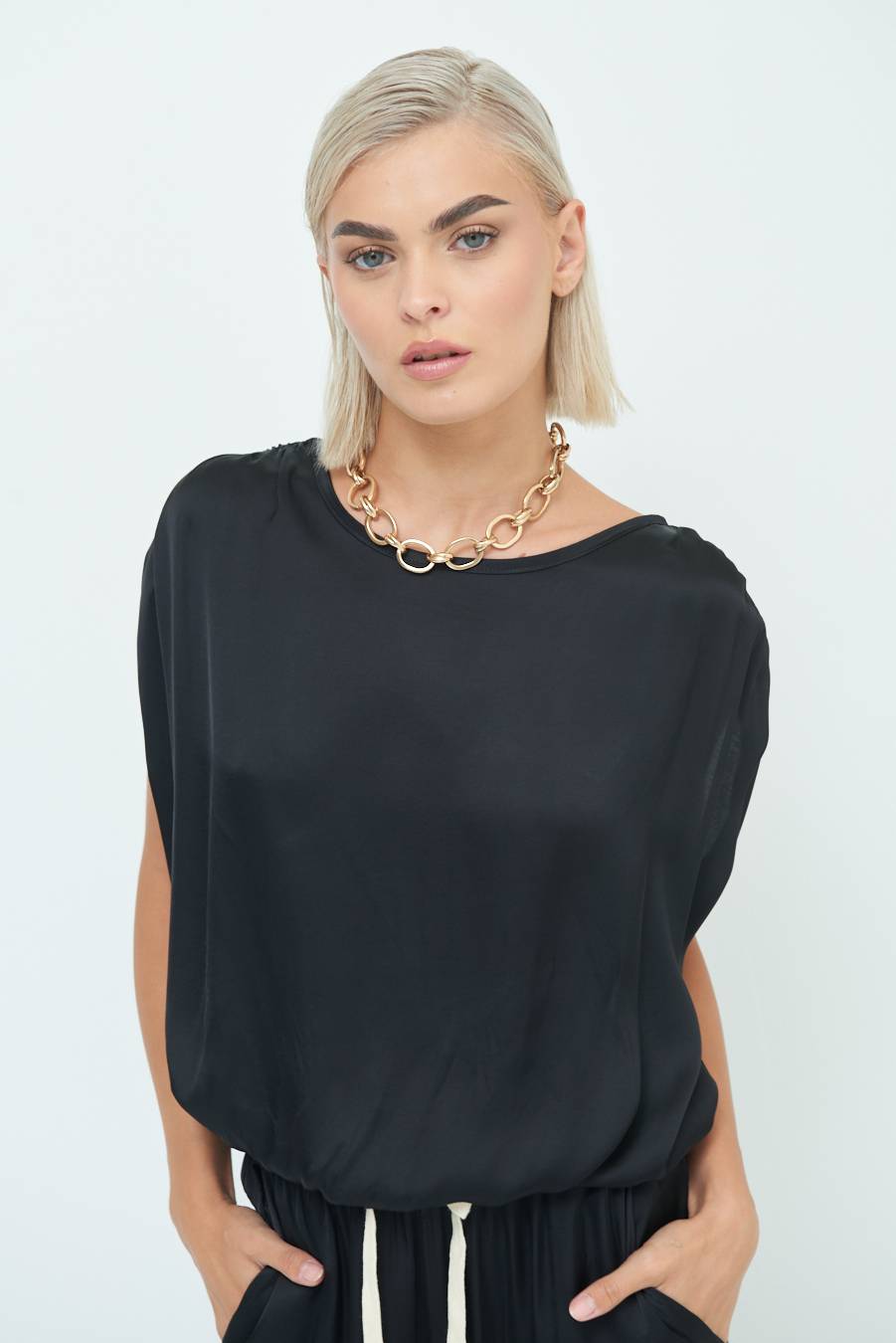 Kikisix TOP CON ELASTICO FONDO SCOLLO BALA NERO Vendita calda