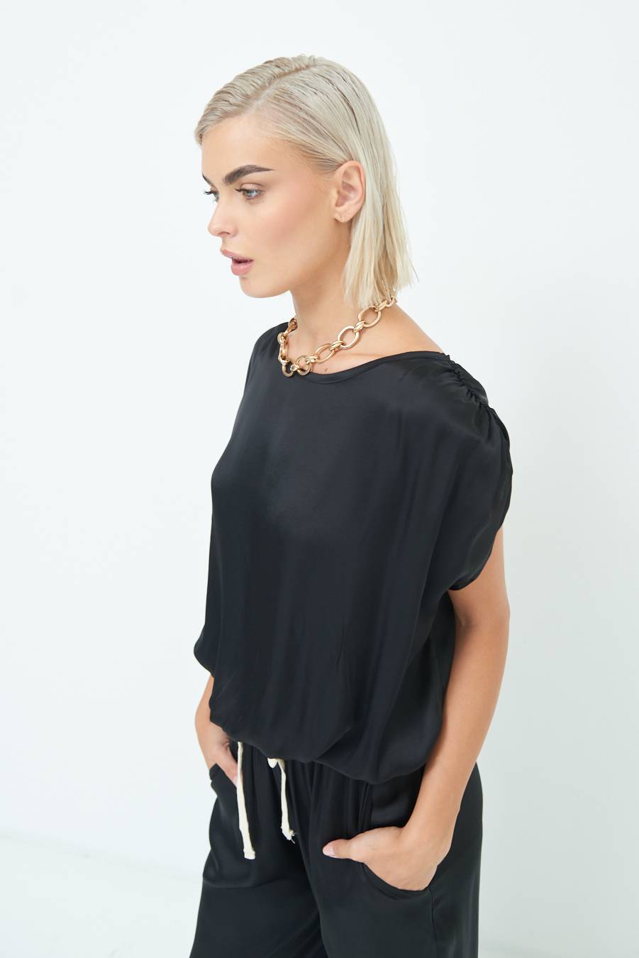 Kikisix TOP CON ELASTICO FONDO SCOLLO BALA NERO Vendita calda