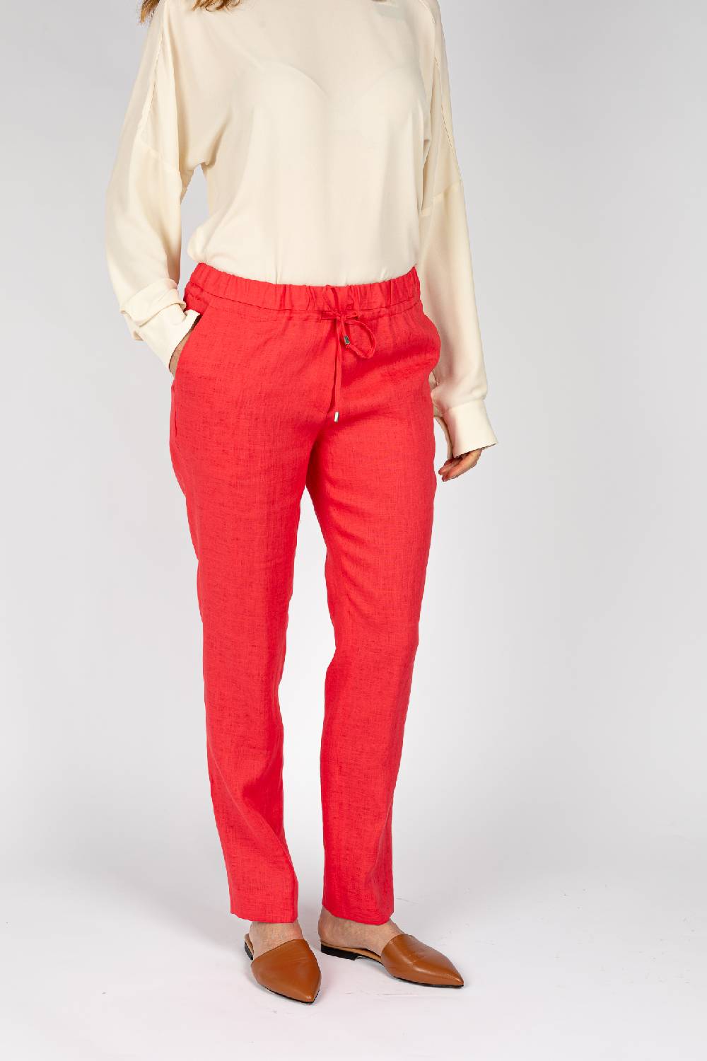 L.Pucci Pantaloni colore corallo, linea morbida Acquista Ora