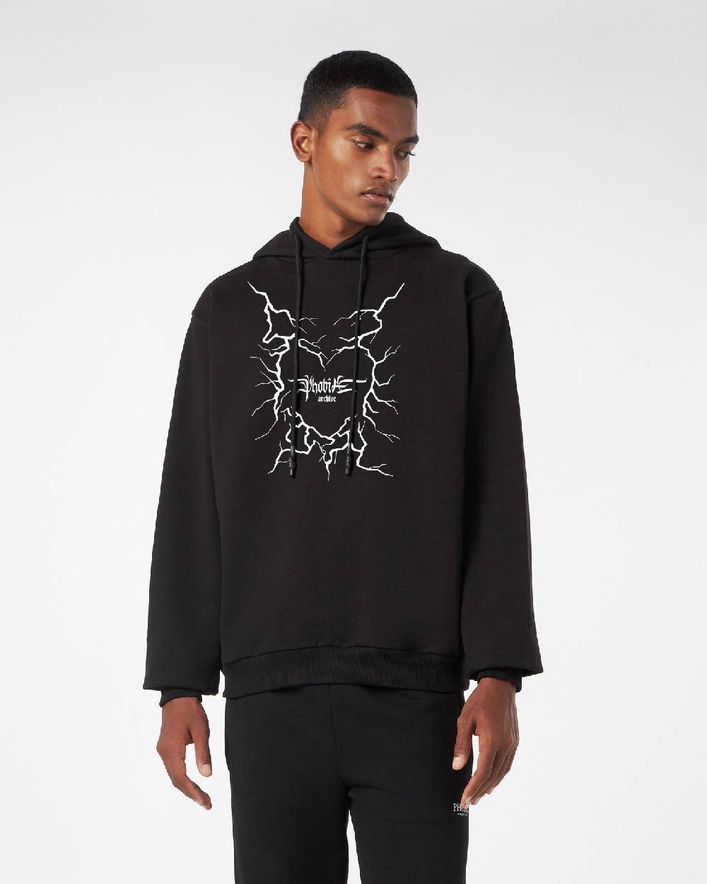 ﻿Phobia Archive FELPA CON CAPPUCCIO NERA CON GRAFICA CUORE LIGHTNING BIANCA Fino Al -60%