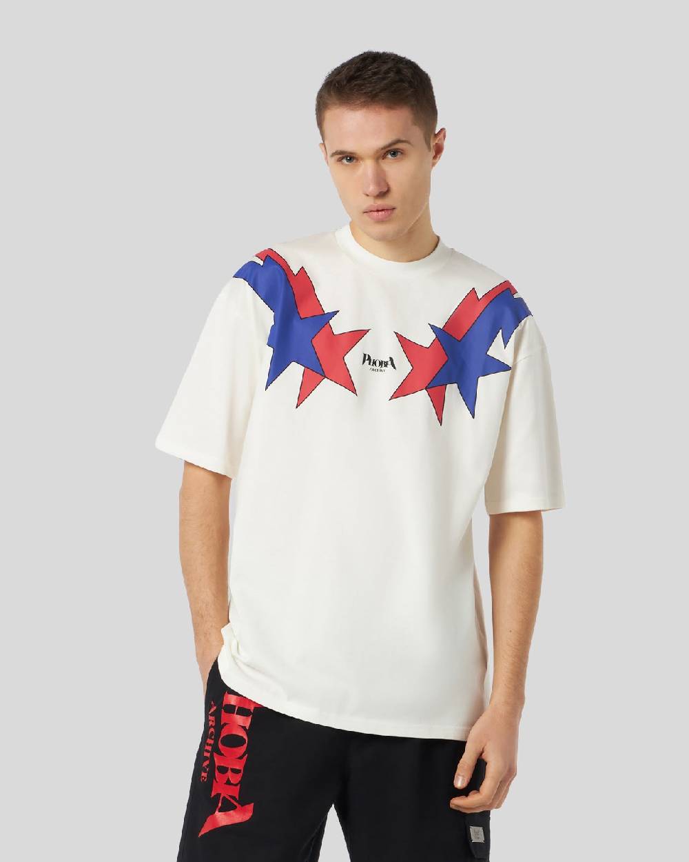 Phobia Archive T-SHIRT BIANCA CON GRAFICA STARRY LIGHTNING ROSSA E BLU Fino Al -60%