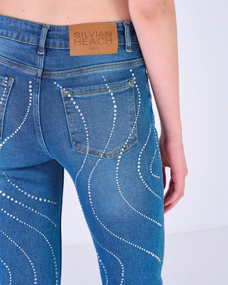 Silvian Heach Jeans a zampa con strass Spedizione gratuita