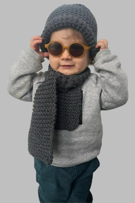 ﻿Zerobarracento Hand-knitted wool scarf for baby Offerta